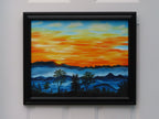 original oil painting, brilliant sunrise over misty mountains and trees, framed in black